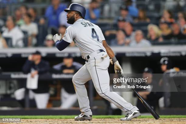 Denard Span of the Seattle Mariners hits a sacrifice fly to drive in a run in the fifth inning during the game against the New York Yankees at Yankee...