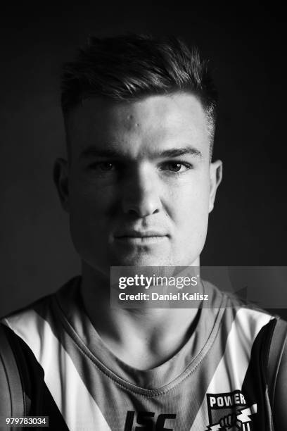 Ollie Wines of the Power poses for a portrait during a Port Power AFL training session at the Adelaide Oval on June 21, 2018 in Adelaide, Australia.