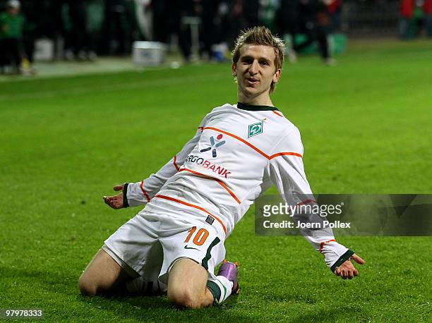 Marko Marin of Bremen celebrates after scoring his team's first goal during the DFB Cup Semi Final match between SV Werder Bremen and FC Augsburg at...