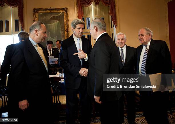 Senator John Kerry speaker with Israeli Prime Minister Benjamin Netanyahu while Senator Charles Schumer , Senator Richard Lugar and Senator Carl...
