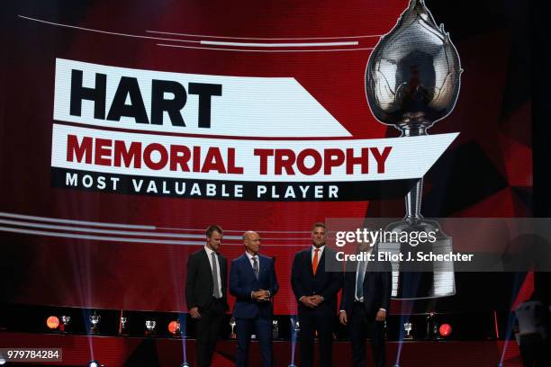 Henrik Sedin, Mark Messier, Eric Lindros and Alex Ovechkin of the Washington Capitals speak onstage to announce the nominees for the Hart Memorial...