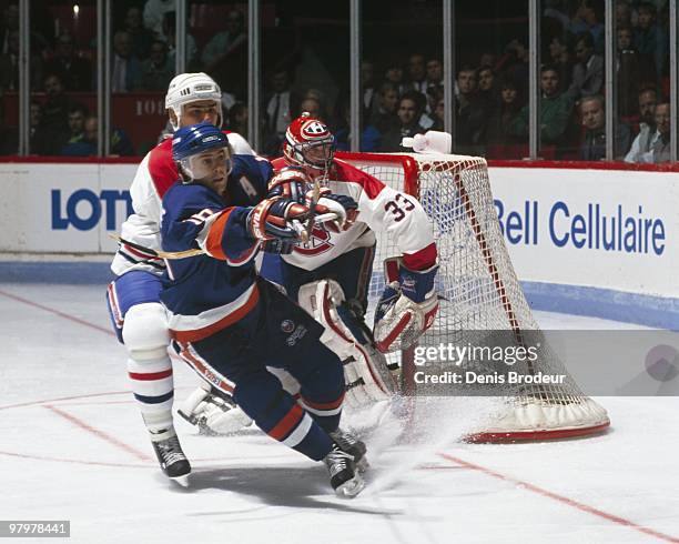 Pat LaFontaine of the New York Islanders skates against the Montreal Canadiens in the 1980's at the Montreal Forum in Montreal, Quebec, Canada.