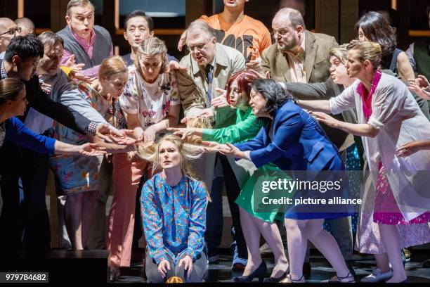 March 2018, Germany, Hamburg: The singer Maria Bengtsson performs with choir members during the photo rehearsal of 'Messa da Requiem'. The opera,...