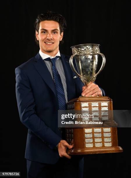 Matthew Barzal of the New York Islanders poses for a portrait with the Calder Memorial Trophy at the 2018 NHL Awards at the Hard Rock Hotel & Casino...