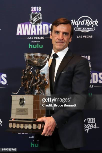 General manager George McPhee of the Vegas Golden Knights poses with the General Manager of the Year award in the press room at the 2018 NHL Awards...
