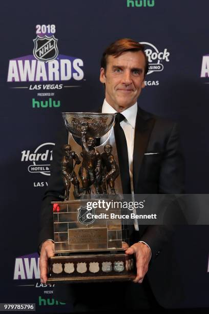 General manager George McPhee of the Vegas Golden Knights poses with the General Manager of the Year award in the press room at the 2018 NHL Awards...