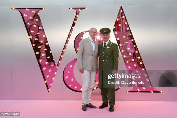 Dylan Jones poses with the Harrods Green Man at the Summer Party at the V&A in partnership with Harrods at the Victoria and Albert Museum on June 20,...