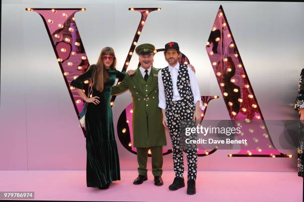 Charlotte Colbert, the Harrods Green Man and Philip Colbert attend the Summer Party at the V&A in partnership with Harrods at the Victoria and Albert...