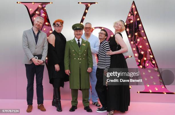 Giles Deacon and Gwendoline Christie poses with the Harrods Green Man at at the Summer Party at the V&A in partnership with Harrods at the Victoria...