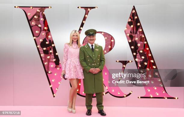 Caprice Bourret poses with the Harrods Green Man at the Summer Party at the V&A in partnership with Harrods at the Victoria and Albert Museum on June...