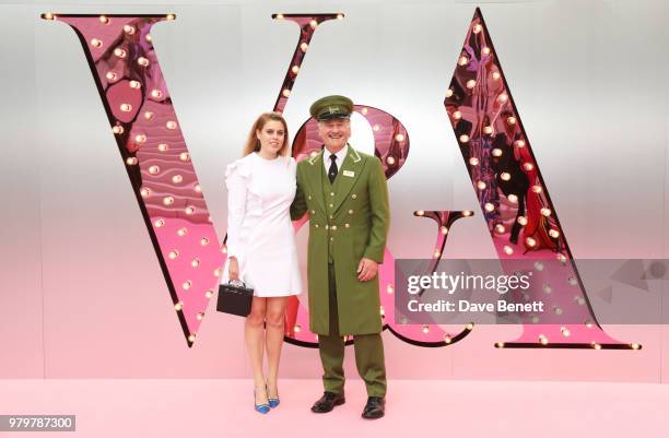 Princess Beatrice of York and poses with the Harrods Green Man at the Summer Party at the V&A in partnership with Harrods at the Victoria and Albert...