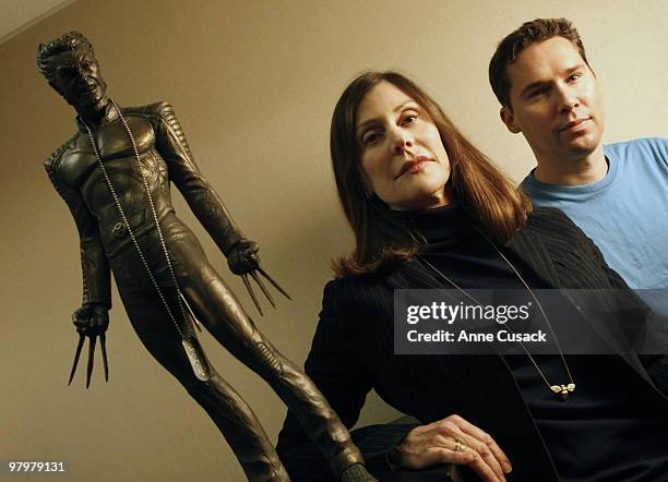 Producer Lauren Shuler Donner and Director Bryan Singer pose for a portrait session for the Los Angeles Times with X-Men character Wolverine on...