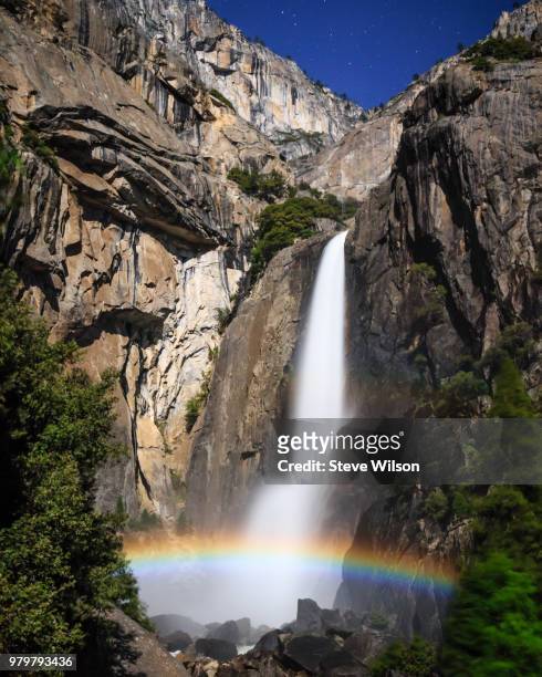 moonbow in foot of lower yosemite falls, yosemite national park, california, usa - moonbow fotografías e imágenes de stock