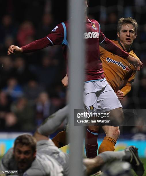 Kevin Doyle of Wolverhampton Wanderers scores the first goal during the Barclays Premier League match between West Ham United v Wolverhampton...