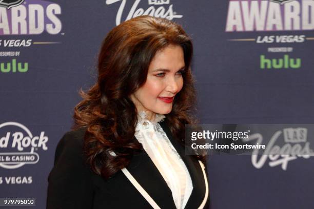 Actress Lynda Carter poses for photos on the red carpet during the 2018 NHL Awards presented by Hulu at The Joint, Hard Rock Hotel & Casino on June...