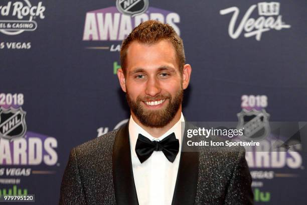 Jason Zucker of the Minnesota Wild poses for photos on the red carpet during the 2018 NHL Awards presented by Hulu at The Joint, Hard Rock Hotel &...