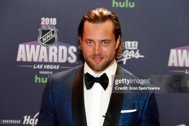 Victor Hedman of the Tampa Bay Lightning poses for photos on the red carpet during the 2018 NHL Awards presented by Hulu at The Joint, Hard Rock...