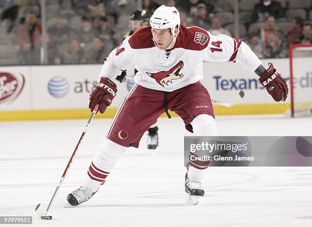 Taylor Pyatt of the Phoenix Coyotes handles the puck against the Dallas Stars on March 21, 2010 at the American Airlines Center in Dallas, Texas.