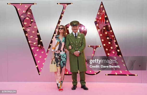 Kelly Eastwood poses with the Harrods Green Man at the Summer Party at the V&A in partnership with Harrods at the Victoria and Albert Museum on June...