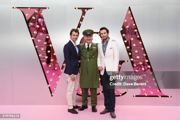 Piotr Krzymowski and Mark-Francis Vandelli pose with the Harrods Green Man at the Summer Party at the V&A in partnership with Harrods at the Victoria...