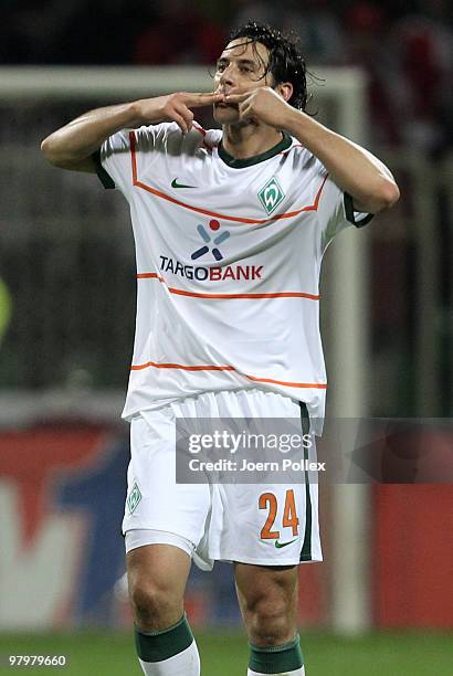 Claudio Pizarro of Bremen celebrates after scoring his team's second goal during the DFB Cup Semi Final match between SV Werder Bremen and FC...