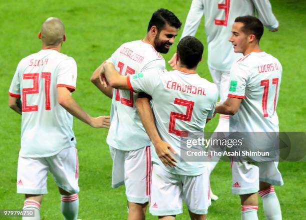Diego Costa of Spain celebrates scoring the opening goal with his team mates during the 2018 FIFA World Cup Russia Group B match between Iran and...