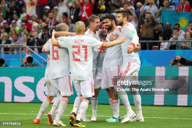 Diego Costa of Spain celebrates scoring the opening goal with his team mates during the 2018 FIFA World Cup Russia Group B match between Iran and...
