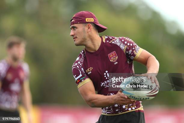 Valentine Holmes passes during a Queensland Maroons State of Origin training session at Sanctuary Cove on June 21, 2018 in Brisbane, Australia.