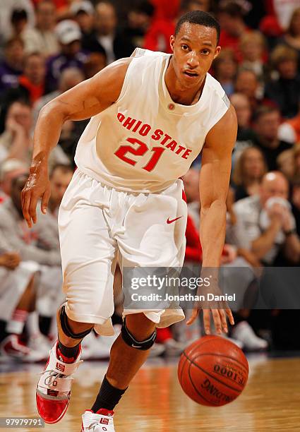 Guard Evan Turner of the Ohio State Buckeyes controls the ball against the Illinois Fighting Illini in the semifinals of the Big Ten Men's Basketball...