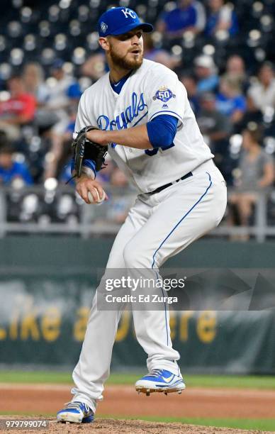 Justin Grimm of the Kansas City Royals throws in the eighth inning aTexas Rangers at Kauffman Stadium on June 20, 2018 in Kansas City, Missouri.