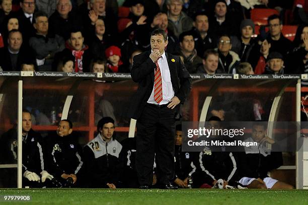 Forest manager Billy Davies looks on during the Coca Cola Championship match between Nottingham Forest and Crystal Palace at the City Ground on March...