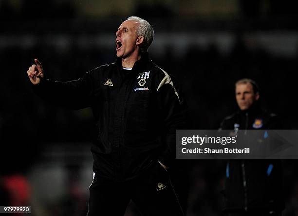 Mick McCarthy, the Wolverhampton Wanderers manager, shouts instructions during the Barclays Premier League match between West Ham United and...