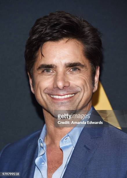 Actor John Stamos arrives at The Academy Of Motion Picture Arts And Sciences presentation of "The Sherman Brothers: A Hollywood Songbook" at the...
