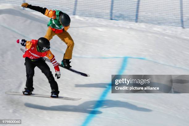 March 2018, South Korea, PyeongChang: Paralympics, Jeongseon Alpine Centre, men's snowboard cross: Mike Minor from the US and OAR's Mikhail Slinkin...