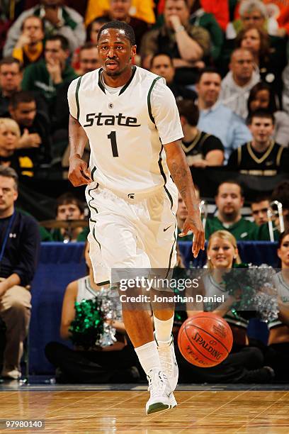 Kalin Lucas of the Michigan State Spartans moves the ball against the Minnesota Golden Gophers during the quarterfinals of the Big Ten Men's...