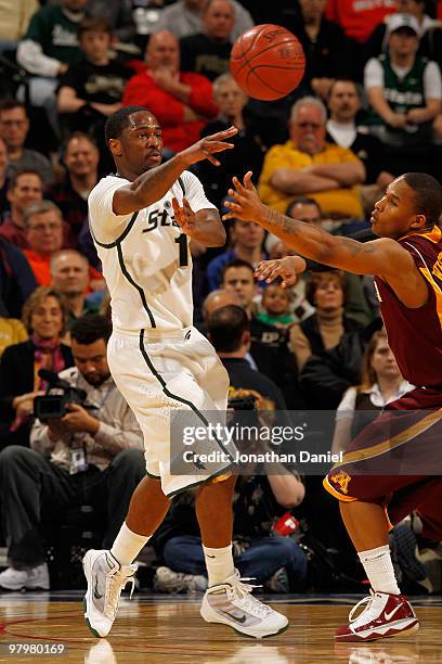 Kalin Lucas of the Michigan State Spartans moves the ball against the Minnesota Golden Gophers during the quarterfinals of the Big Ten Men's...