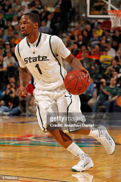 Kalin Lucas of the Michigan State Spartans moves the ball against the Minnesota Golden Gophers during the quarterfinals of the Big Ten Men's...