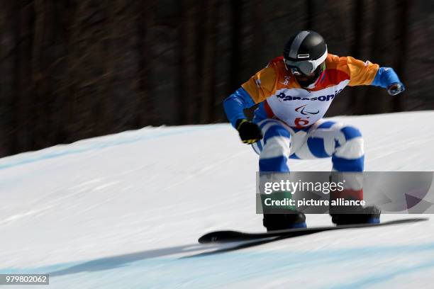 March 2018, South Korea, PyeongChang: Paralympics, Jeongseon Alpine Centre, men's snowboard cross: Italy's Jacopo Luchini in action. Photo: Jan...