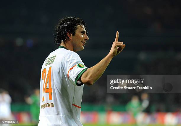 Claudio Pizarro of Bremen celebrates scoring his team's second goal during the DFB cup semi final match between SV Werder Bremen and FC Augsburg at...