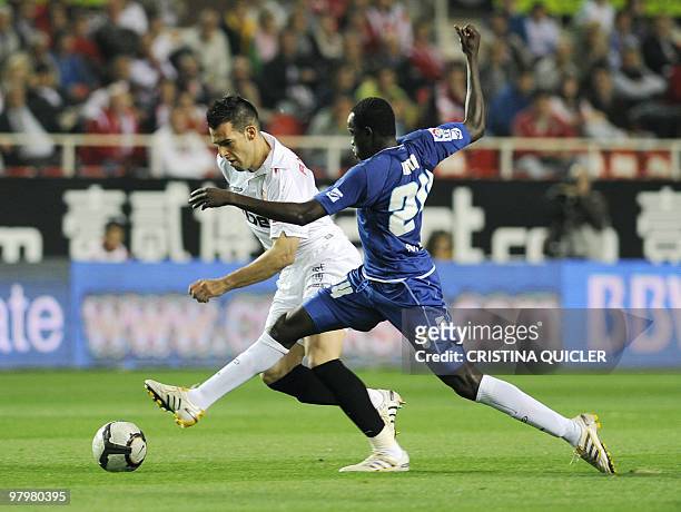 Sevilla's midfielder Alvaro Negredo vies with Xerez's Malian midfielder Yaya Keita during a Spanish league football match at Sanchez Pizjuan stadium...