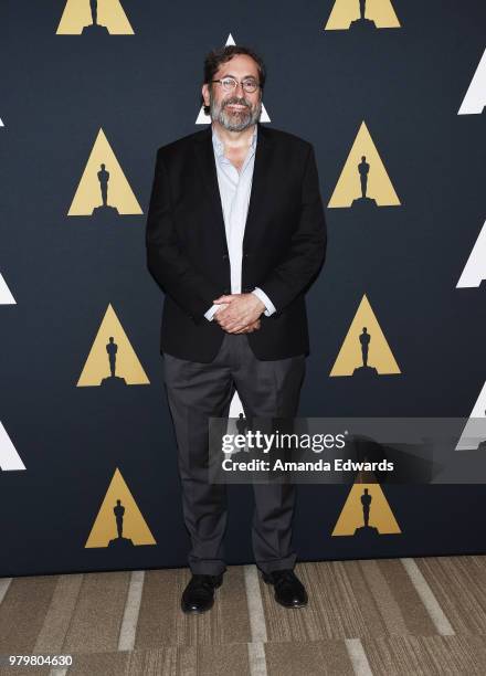 Screenwriter Bob Peterson arrives at The Academy Of Motion Picture Arts And Sciences presentation of "The Sherman Brothers: A Hollywood Songbook" at...