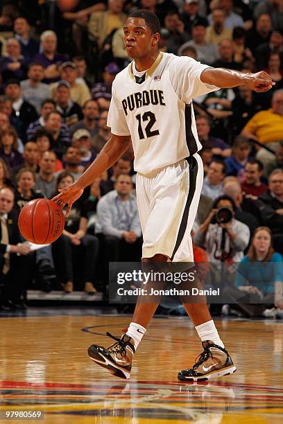 Kelsey Barlow of the Purdue Boilermakers dribbles the ball against the Northwestern Wildcats during the quarterfinals of the Big Ten Men's Basketball...