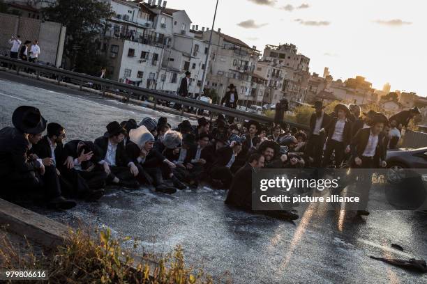 Dpatop - Ultra-Orthodox Jewish men take part in a demonstration against Israeli army conscription in Bnei Brak, Israel, 12 March 2018. Photo: Ilia...