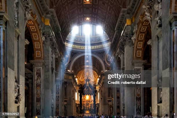 luce in s.pietro1 - vatican stock pictures, royalty-free photos & images