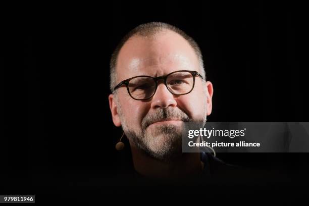 March 2018, Germany, Cologne: The British author Ian McGuire sits on stage in the course of the literature festival Lit.Cologne. Photo: Rolf...