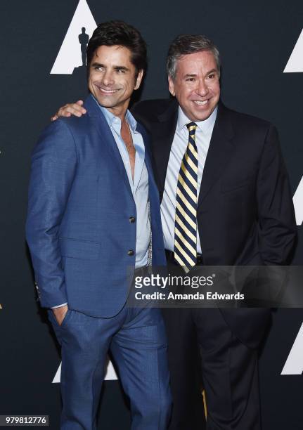 Actor John Stamos and producer Gregg Sherman arrive at The Academy Of Motion Picture Arts And Sciences presentation of "The Sherman Brothers: A...