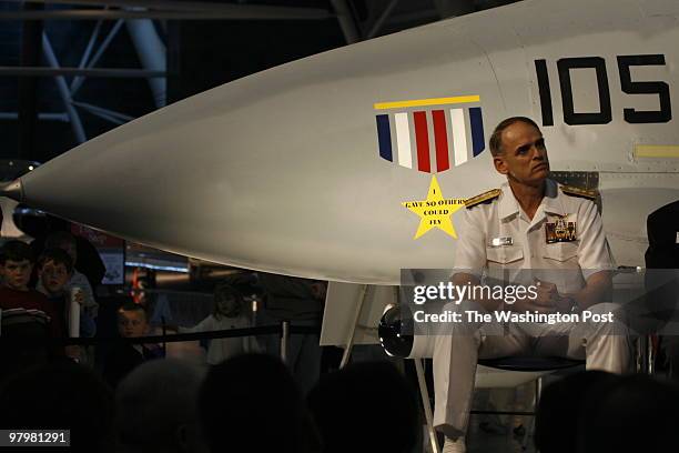 By Dayna Smith/twp SUBJECT: The F-14, the fighter plane that Navy pilots flew for three decades is "retired" at a ceremony at the Udvar-Hazy Center...