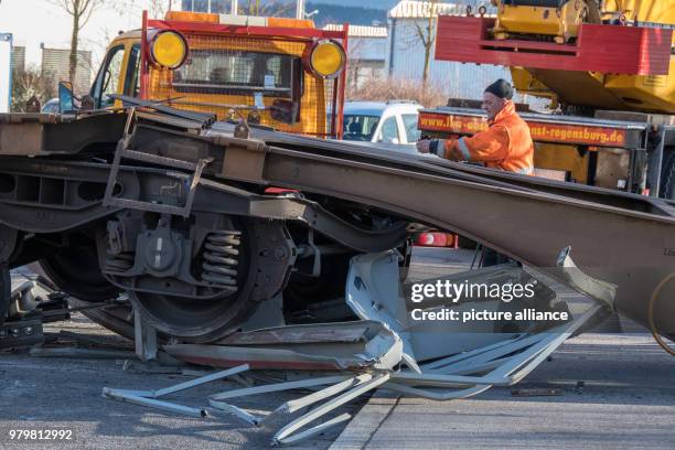March 2018, Germany, Regensburg: A completely destroyed waggon pictured along a street. A switching engine pushed several waggons into a truck at a...