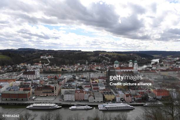 March 2018, Passau, Germany: Sun and clouds over the lower Bavarian three-river city Passau can be seen from high above. Photo: Felix Hörhager/dpa