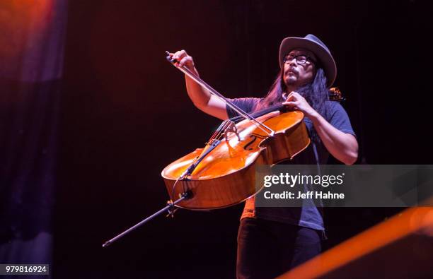 Cello player Joe Kwon of The Avett Brothers performs at PNC Music Pavilion on June 20, 2018 in Charlotte, North Carolina.